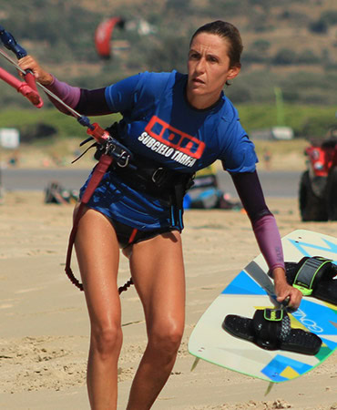 Female kitesurf instructor preparing a lesson on Tarifa beach